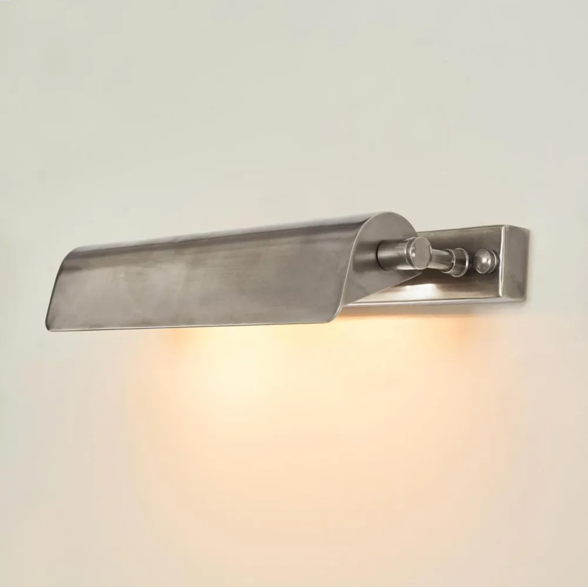 Metal picture light on a light gray background