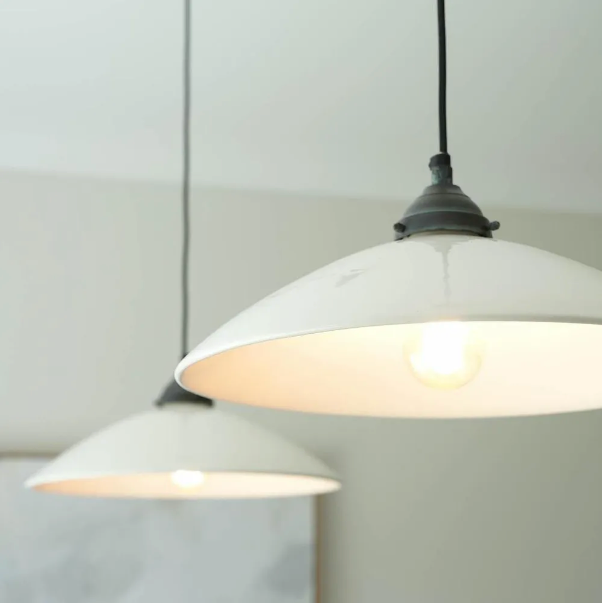 Close-up of a white Newport pendant light
