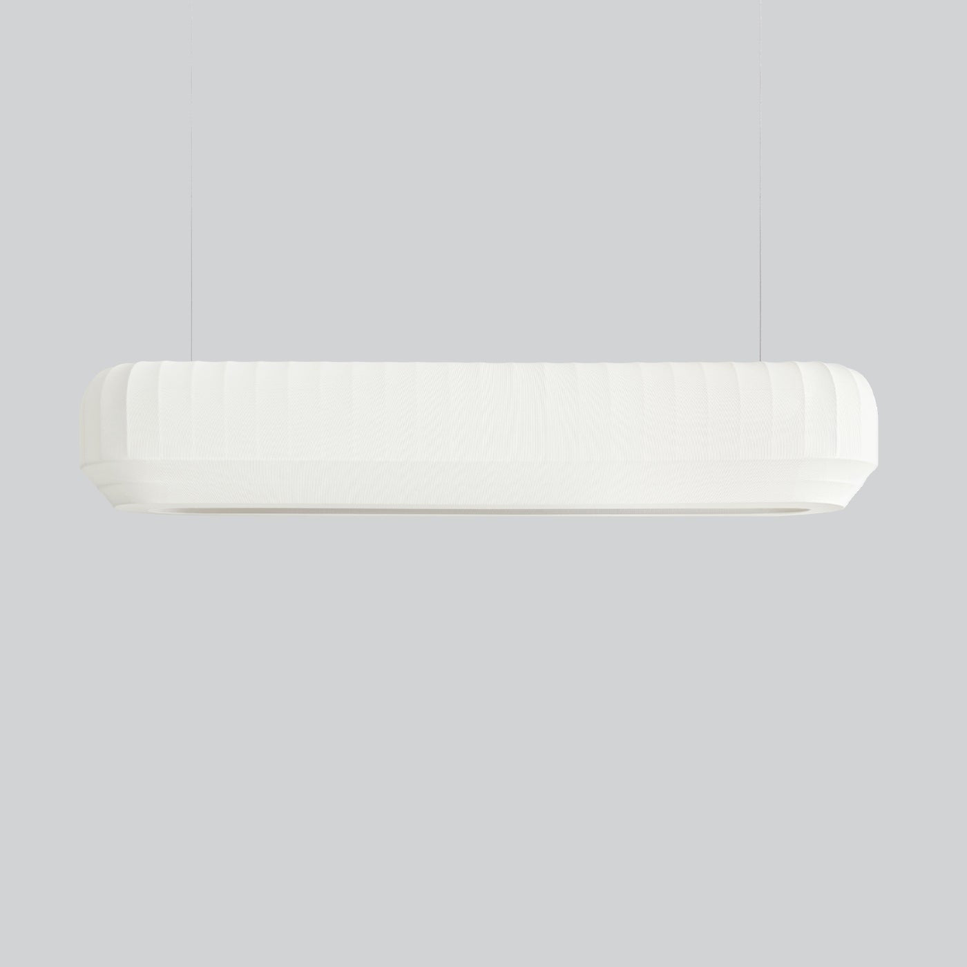 Rectangular white light fixture on a gray background