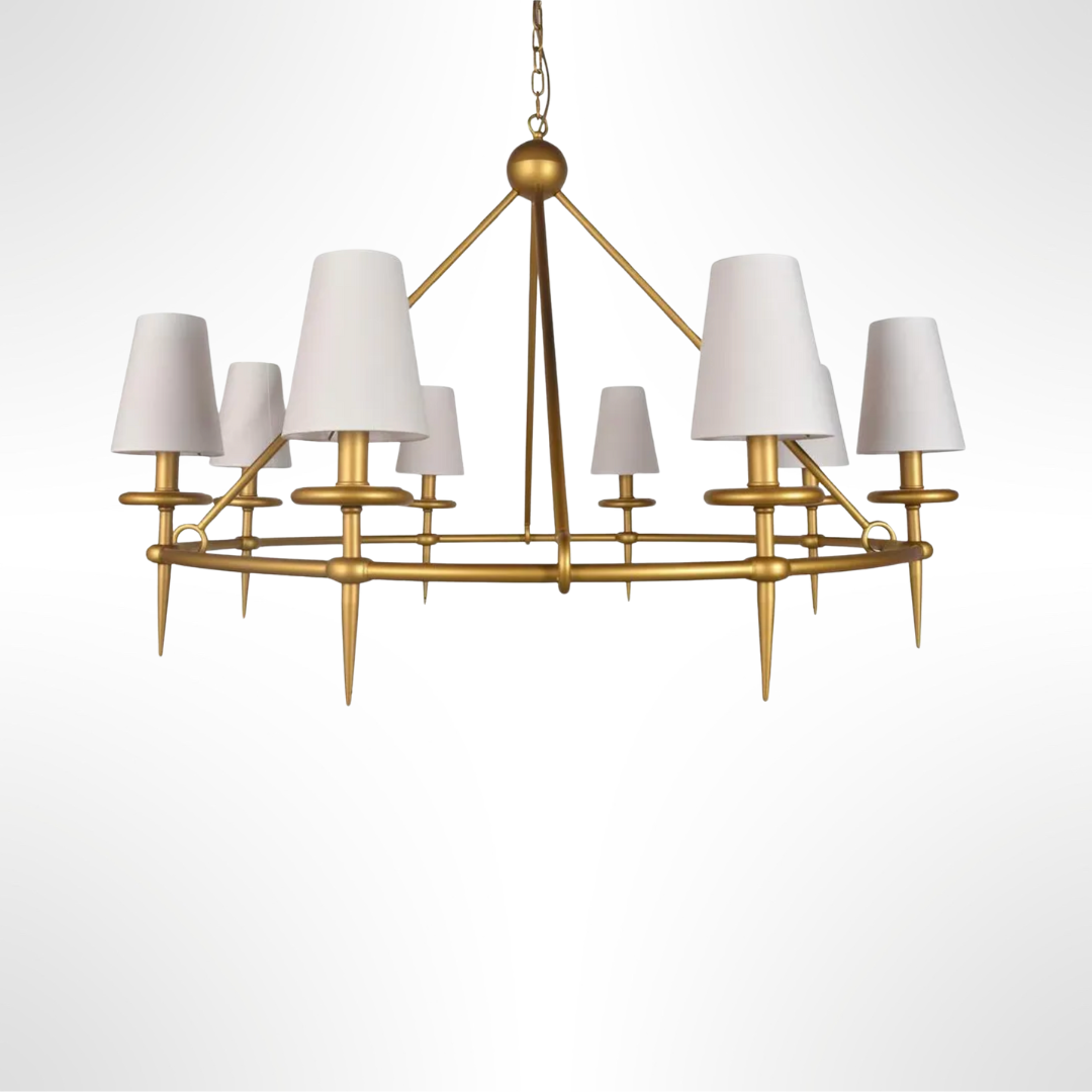 Gold chandelier with white lampshades on a white background